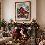 Snowy Red Barn Christmas poster framed in a cozy living room